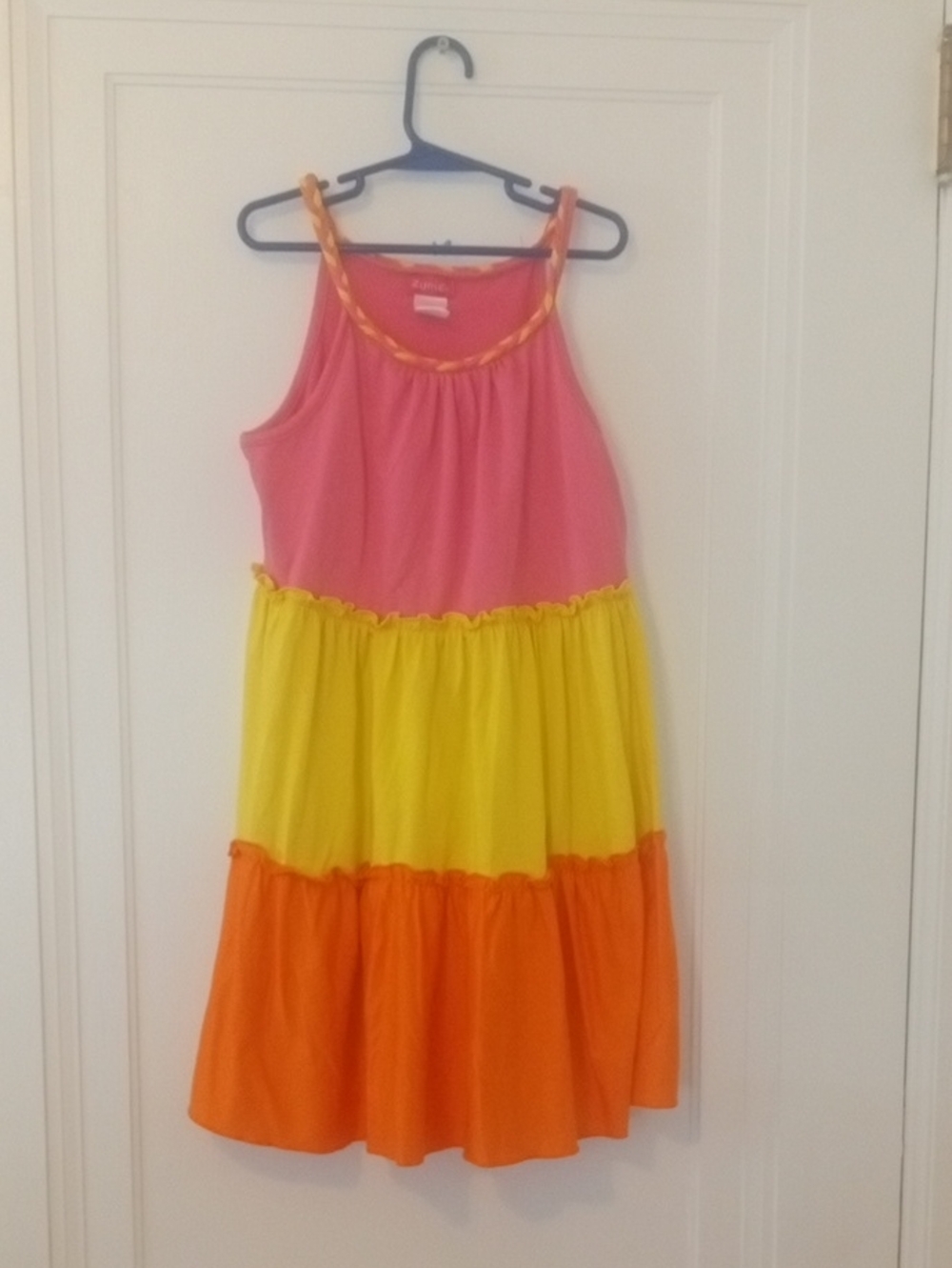 girl large bright colorful spaghetti strap dress